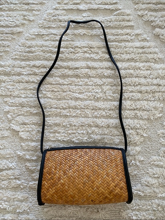 Urban Outfitters Handbags - Urban Outfitters Woven Straw Crossbody Bag with Black Trim